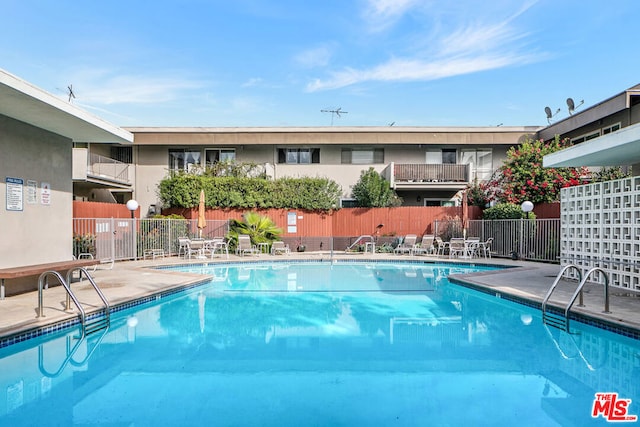 view of pool featuring a patio area