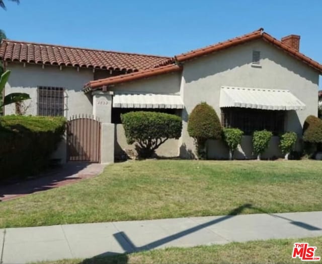 view of home's exterior featuring a yard