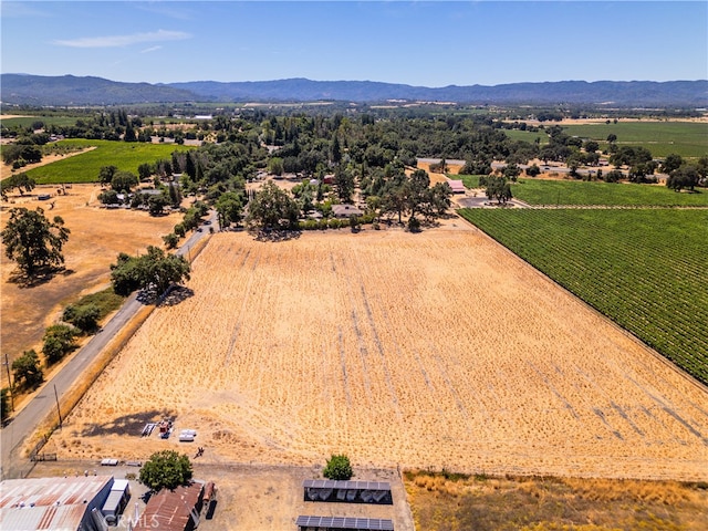 aerial view with a mountain view and a rural view