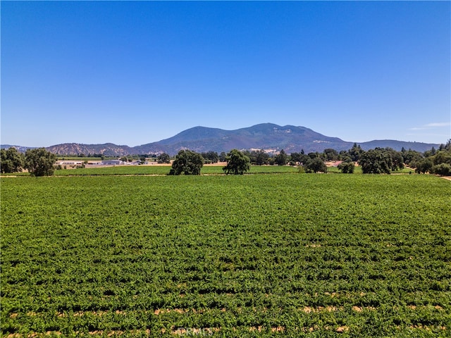 view of mountain feature with a rural view