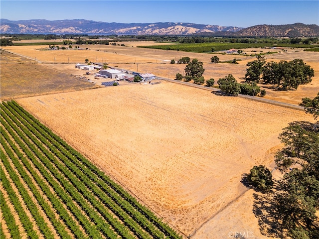 bird's eye view featuring a mountain view and a rural view