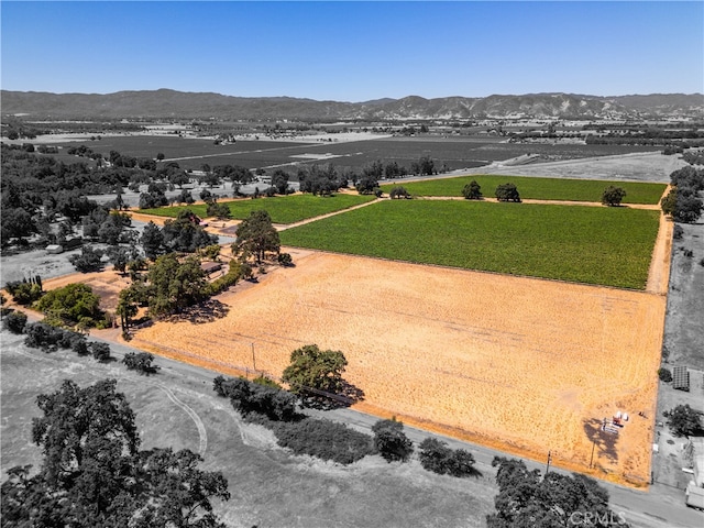 drone / aerial view featuring a mountain view