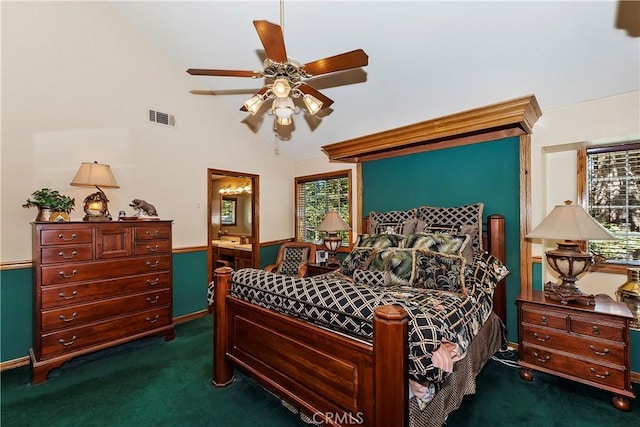 30184 Sky Line Dr, Running Springs, CA 92382 - bedroom featuring dark colored carpet, multiple windows, a wainscoted wall, lofted ceiling, and ensuite bath