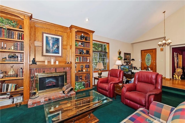 30184 Sky Line Dr, Running Springs, CA 92382 - living area with a fireplace, a chandelier, and vaulted ceiling