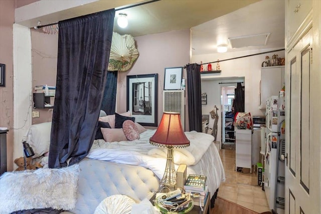 bedroom with light tile patterned flooring