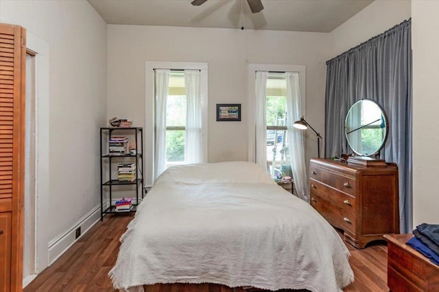 bedroom featuring dark wood-type flooring and ceiling fan