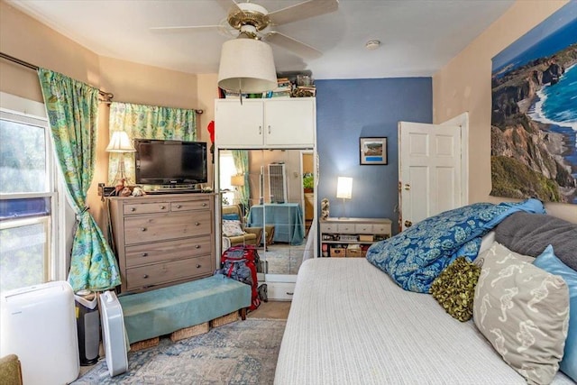 bedroom featuring ceiling fan