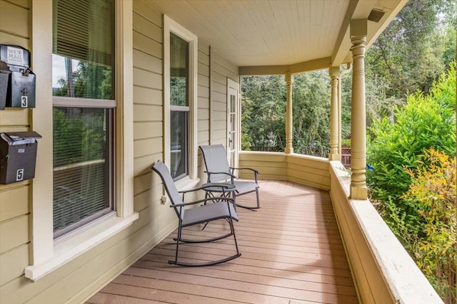 deck with covered porch