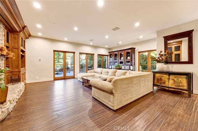 living room with french doors and dark hardwood / wood-style flooring