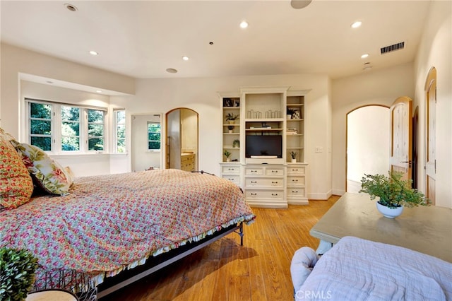 bedroom with light hardwood / wood-style floors