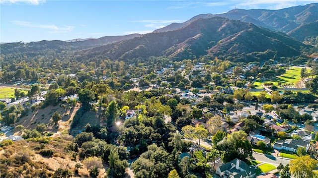 drone / aerial view featuring a mountain view