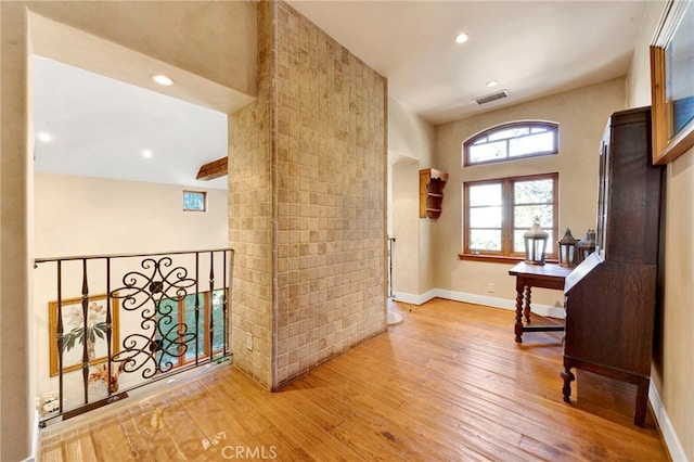 foyer entrance with wood-type flooring