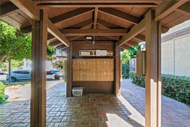 view of patio featuring mail area