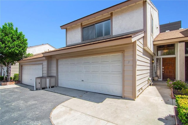 exterior space featuring a garage