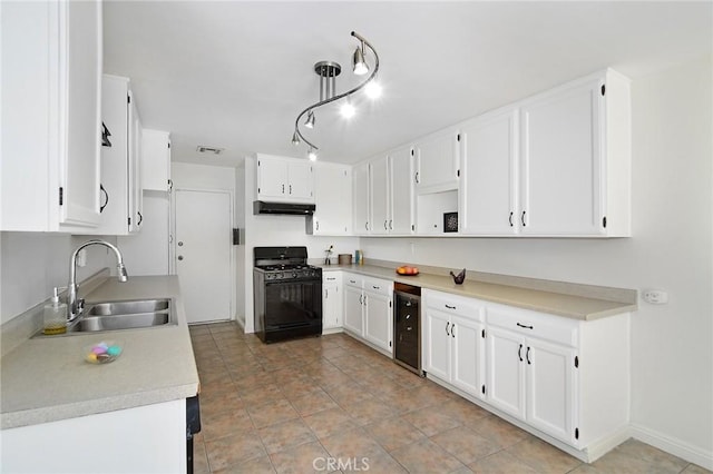 kitchen with black range with gas stovetop, sink, white cabinets, and wine cooler