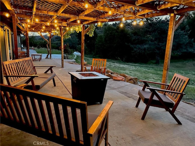 view of patio with an outdoor fire pit and a pergola