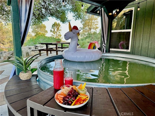 wooden balcony featuring a deck