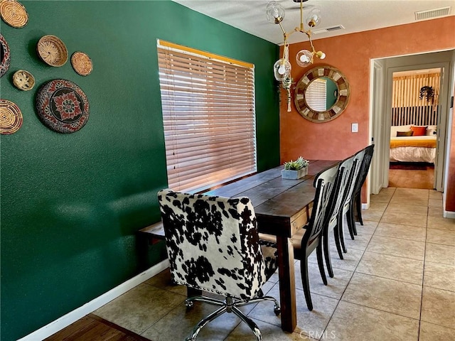 dining room with light tile patterned floors