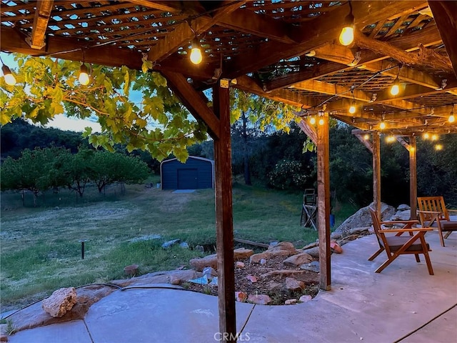 view of patio / terrace with a storage shed