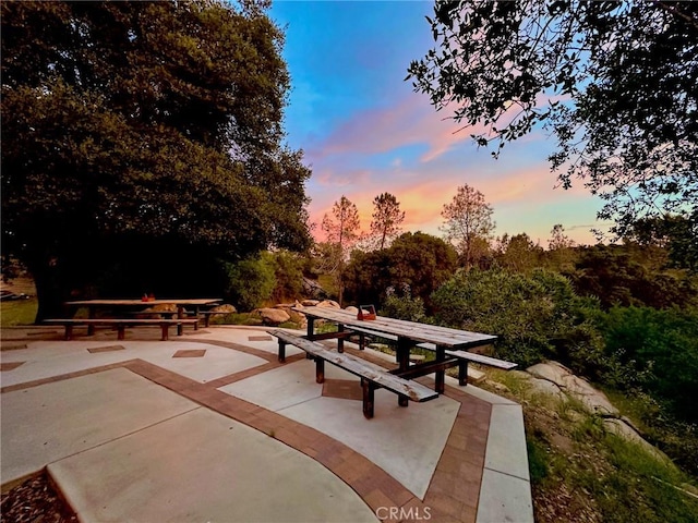 surrounding community with a patio