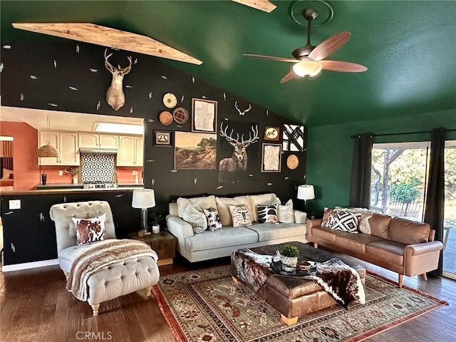 living room featuring dark wood-type flooring, ceiling fan, and lofted ceiling with beams