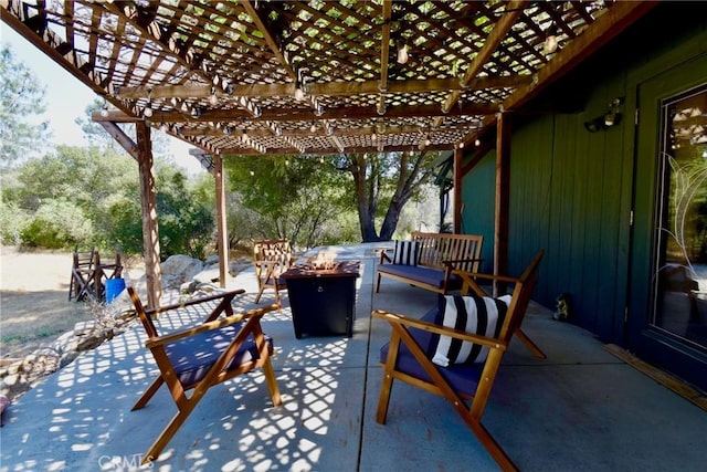 view of patio featuring an outdoor fire pit