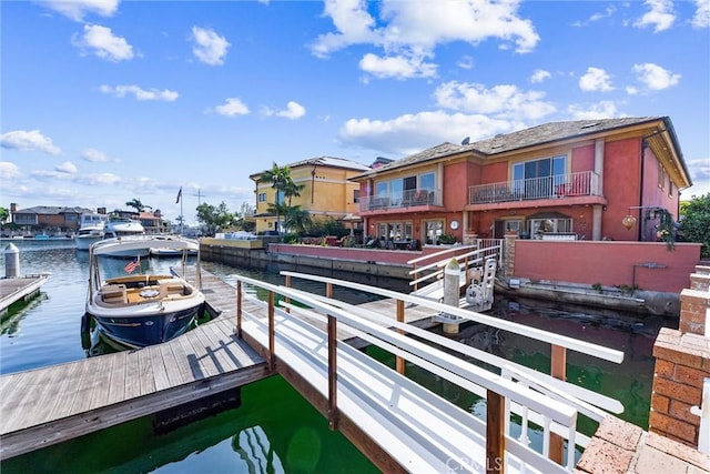 dock area with a water view