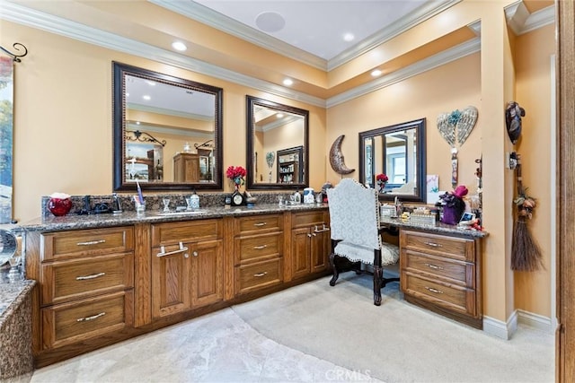 bathroom featuring vanity and ornamental molding