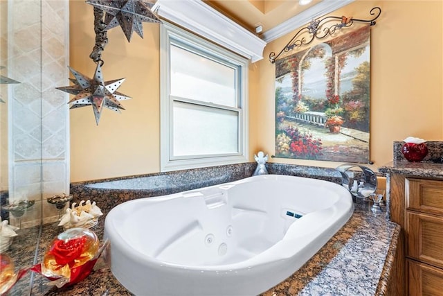 bathroom featuring a washtub and ornamental molding