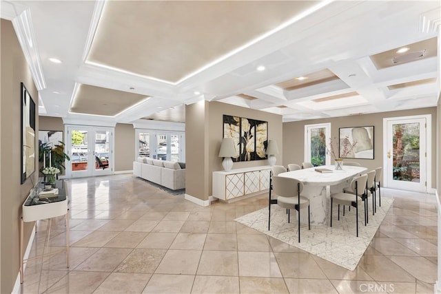 tiled dining space featuring french doors, beamed ceiling, coffered ceiling, and ornamental molding