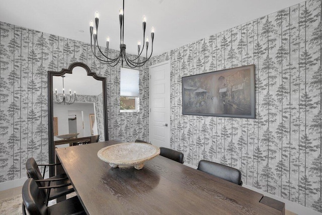 dining space featuring a notable chandelier