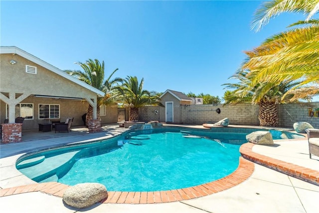 view of swimming pool featuring a patio