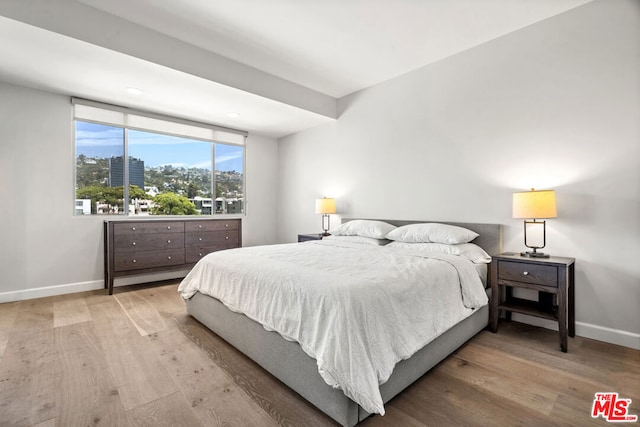 bedroom with light hardwood / wood-style flooring