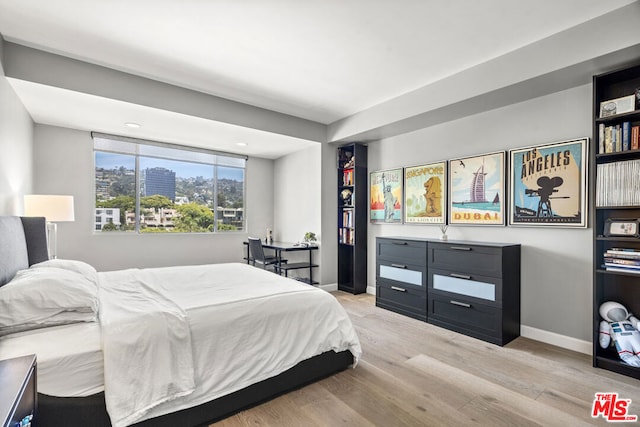 bedroom featuring light hardwood / wood-style floors