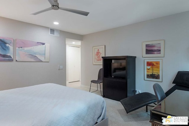 carpeted bedroom with ceiling fan