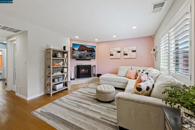 living room with light hardwood / wood-style flooring