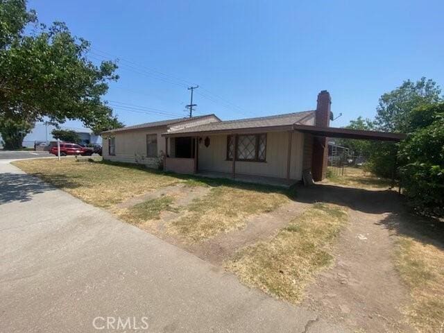 1452 W 132nd St, Gardena, CA 90249 - single story home with a chimney and a carport