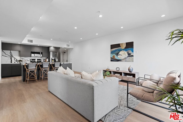 living room featuring light hardwood / wood-style flooring