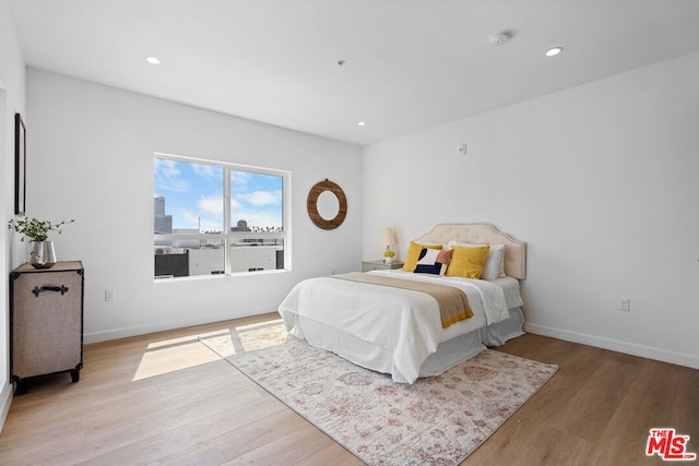 bedroom featuring light wood-type flooring