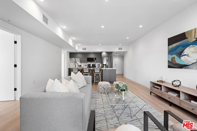 living room featuring light hardwood / wood-style flooring