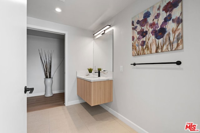 bathroom with vanity and tile patterned floors