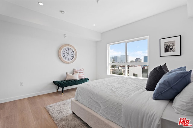 bedroom featuring light hardwood / wood-style flooring