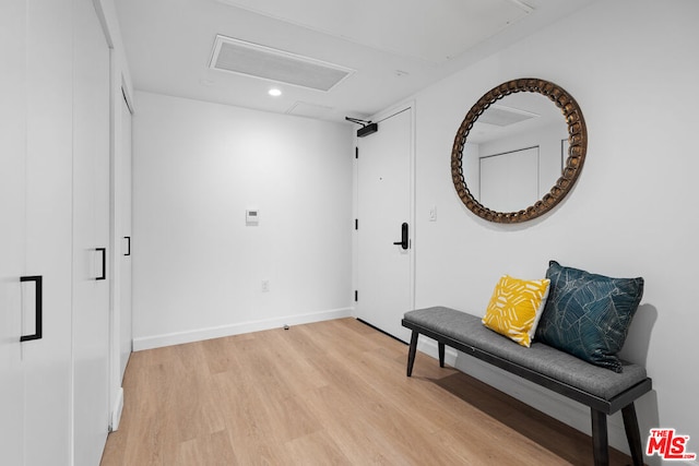 living area featuring light hardwood / wood-style floors