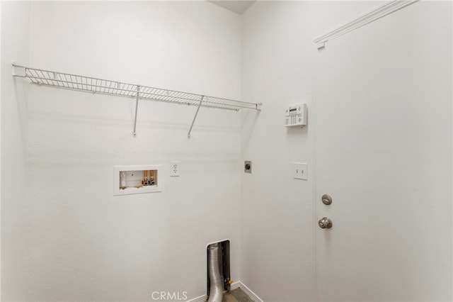 clothes washing area featuring electric dryer hookup and hookup for a washing machine