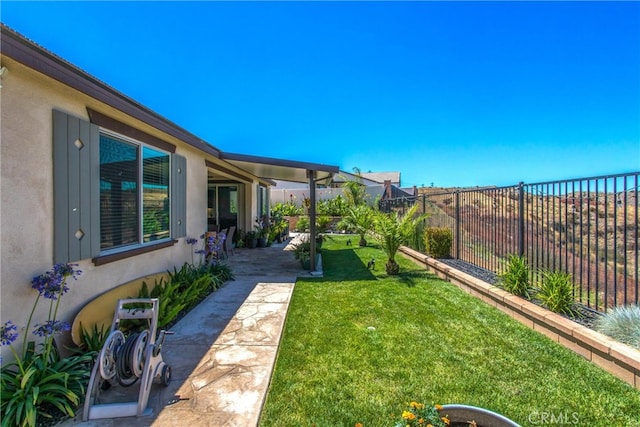 view of yard featuring a patio area