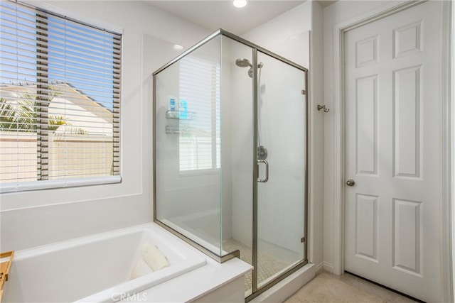 bathroom with a wealth of natural light and plus walk in shower