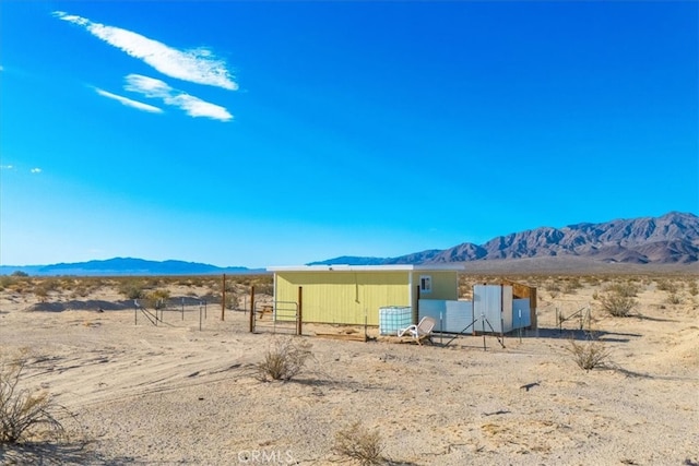 exterior space with a mountain view and a rural view