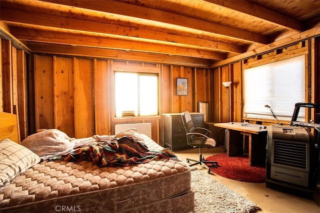 miscellaneous room featuring wood ceiling, beamed ceiling, and heating unit