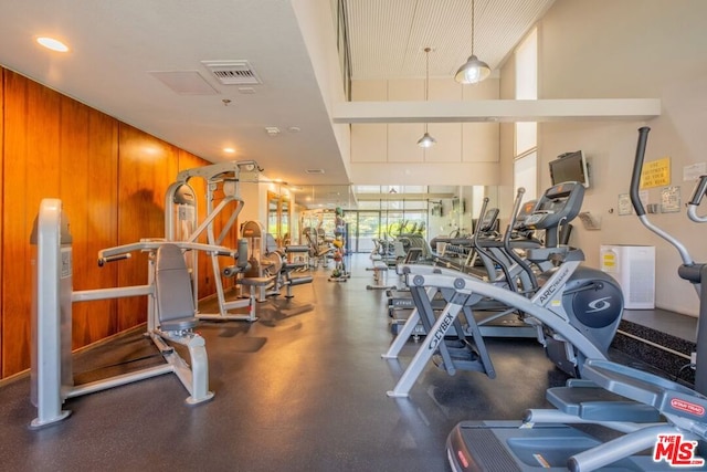 gym with wood walls