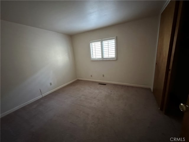 spare room with carpet flooring